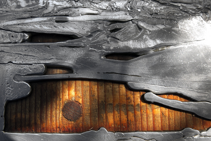 Illustration for article titled Casting Molten Metal On Wood With a Hungarian Design Master